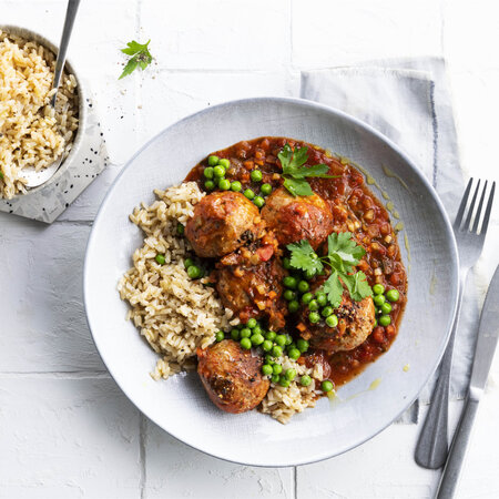 Image of Neapolitan meatballs with brown rice and garden peas recipe made with Ardo products